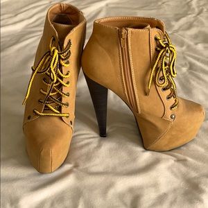 Tan ankle booties with “work boot” style laces